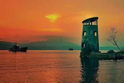 Scenic view of sea against sky during sunset