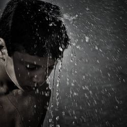 Close-up portrait of wet boy