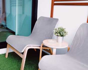 Empty chairs and table at home