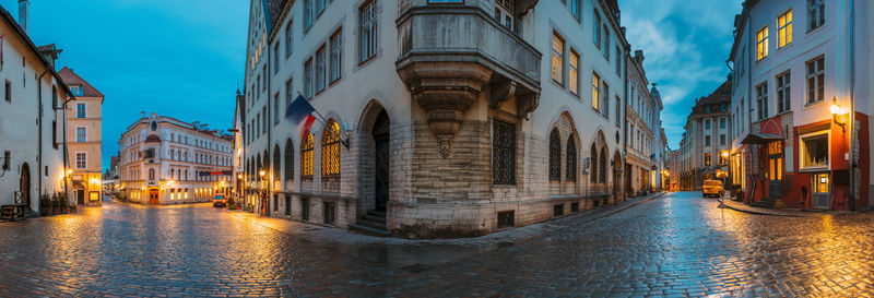 Canal amidst buildings in city