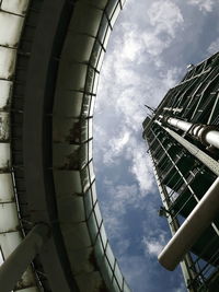 Low angle view of building against cloudy sky