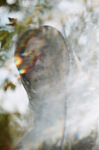 Close-up of woman during foggy weather