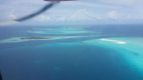 Aerial view of sea against sky