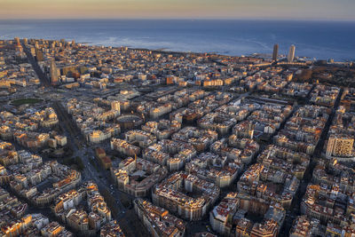 High angle view of cityscape by sea