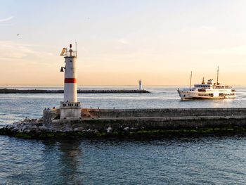 Scenic view of sea against sky at sunset