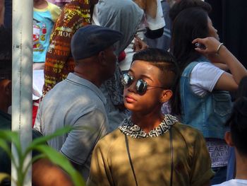 Portrait of young couple with mobile phone