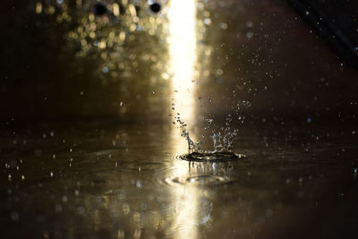 Close-up of water splashing on lake