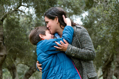 Mother and son on tree