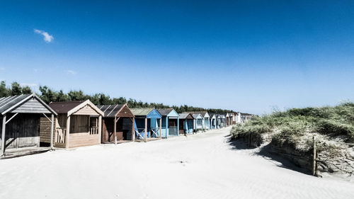 Beach huts on sand 