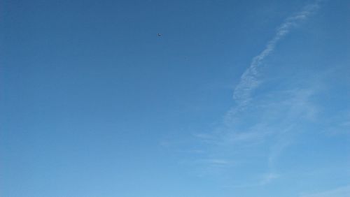 Low angle view of vapor trail in sky