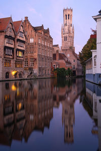 Historic buildings on the canals of bruges, belgium