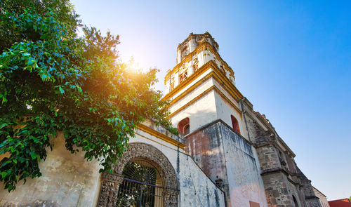 Low angle view of traditional building against sky