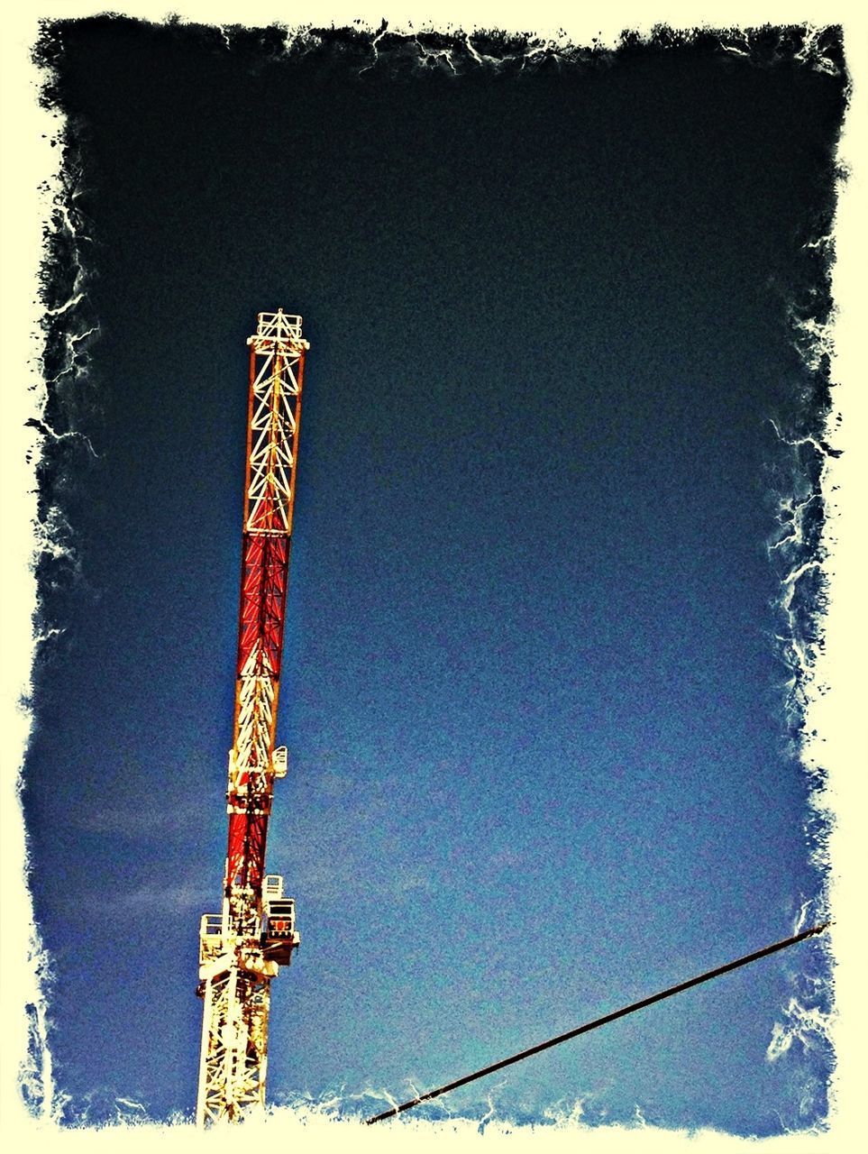 low angle view, transfer print, tall - high, tower, auto post production filter, built structure, sky, architecture, clear sky, communication, communications tower, famous place, no people, religion, outdoors, tree, travel destinations, building exterior, day, international landmark