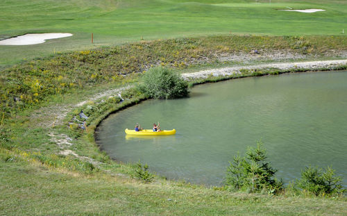 High angle view of people on lake