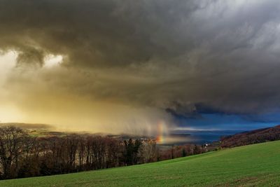 Storm clouds over land