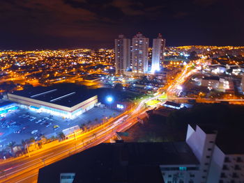 High angle view of illuminated city at night