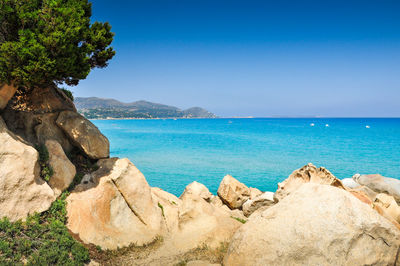 Scenic view of sea against blue sky