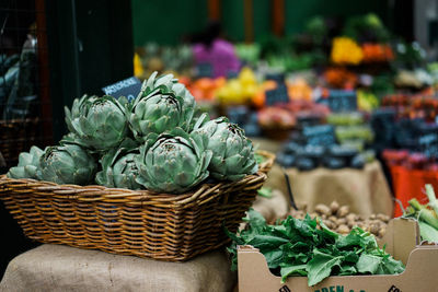 Potted plant in basket at market stall