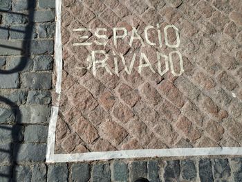 Close-up of text on wall