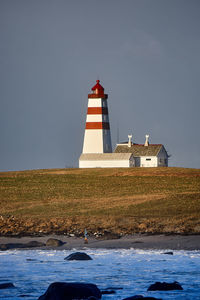 The lighthouse of alnes on godøy, sunnmøre, møre og romsdal, norway.