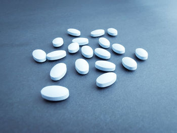 High angle view of coins on table