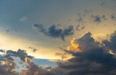 Low angle view of clouds in sky during sunset