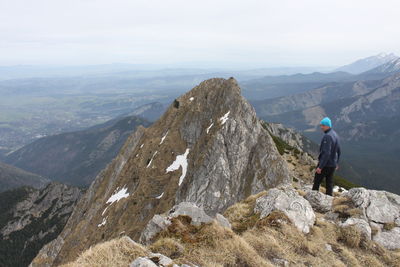 Hiker standing on giewont mountain