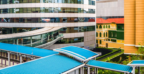 Reflection of building in swimming pool