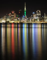 Illuminated buildings at waterfront