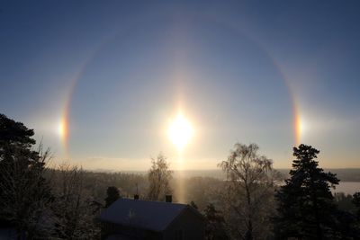 Sun shining over landscape