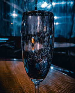 Close-up of wine glass on table