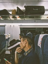 High angle view of man in train