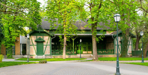 Exterior of built structure by trees in park