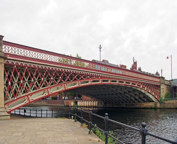 Bridge over river against sky