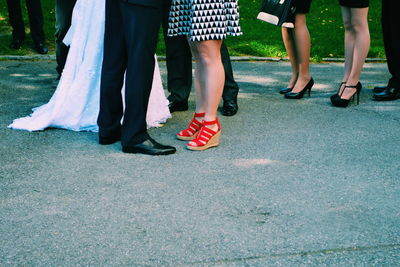 Low section of people during wedding ceremony