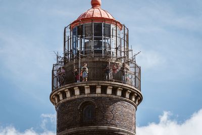 Low angle view of water tower against sky