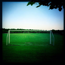 View of field against clear sky