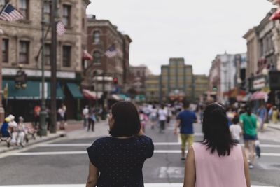 Women walking on city street