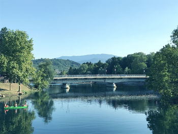 Bridge over river against clear sky