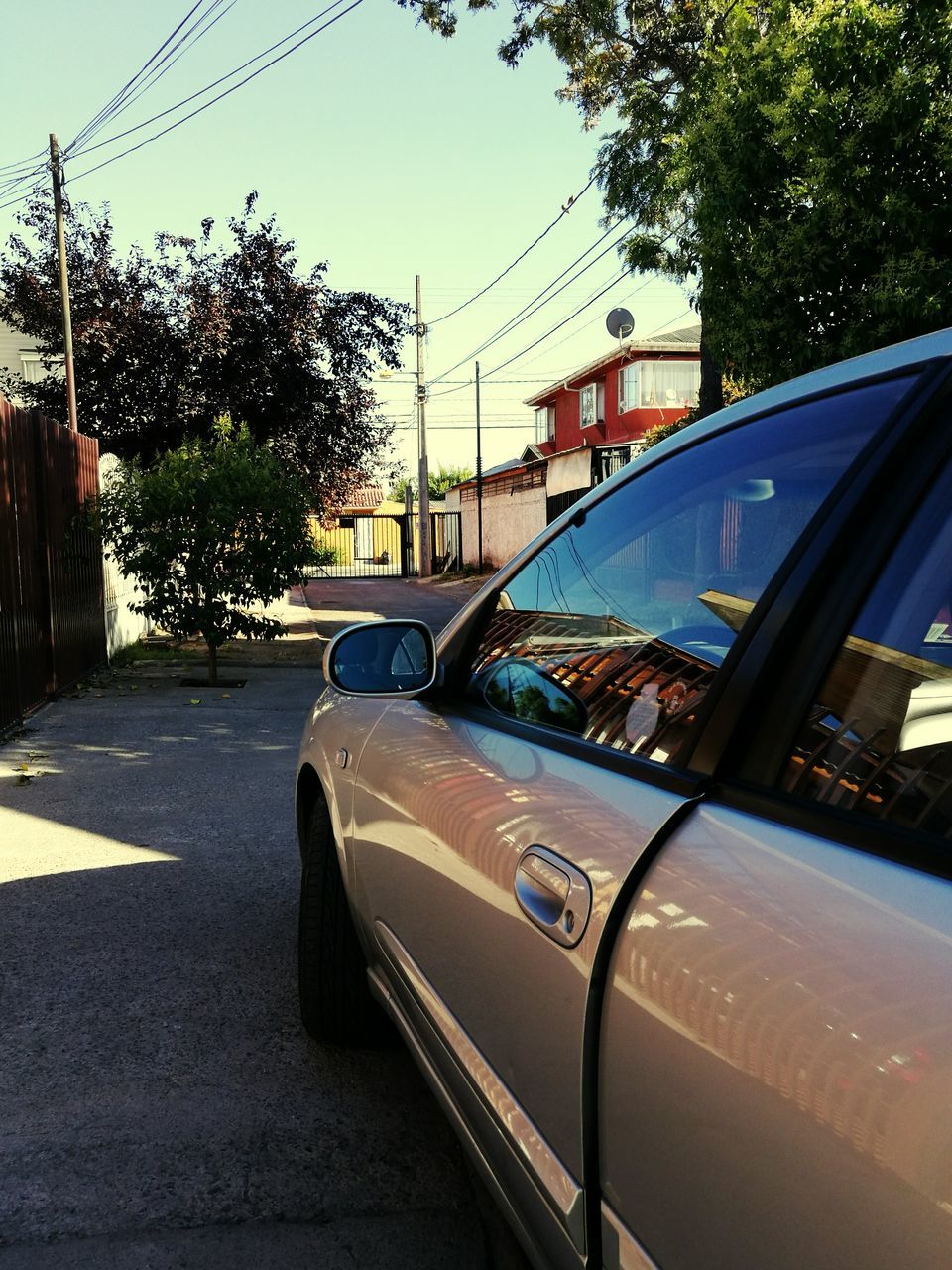 car, transportation, land vehicle, tree, mode of transport, no people, day, outdoors, sky, city, close-up