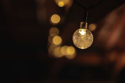 Close-up of illuminated lighting equipment