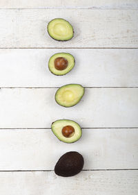 High angle view of fruits against white background