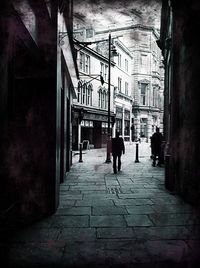 Narrow walkway in city