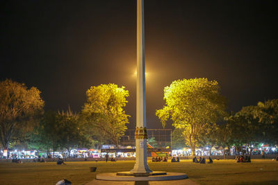 Group of people in park at night