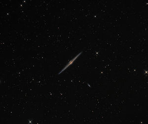 Low angle view of stars in dark sky