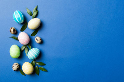 Directly above shot of easter egg on blue background