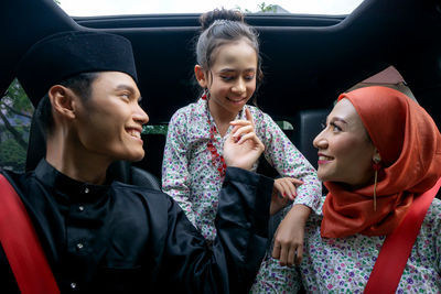 Asian muslim family feeling happy return to the village to celebrate eid with grandparents 