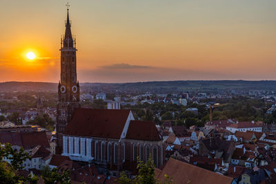 High angle view of townscape against sky during sunset