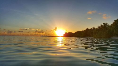 Scenic view of sea against sky during sunset