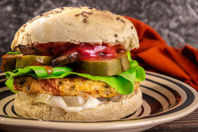 Close-up of burger in plate on table